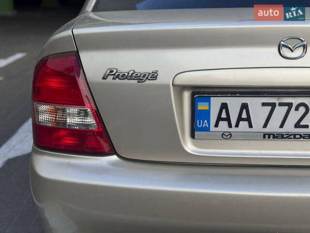 Серый Мазда Протеж, объемом двигателя 2 л и пробегом 85 тыс. км за 3600 $, фото 8 на Automoto.ua