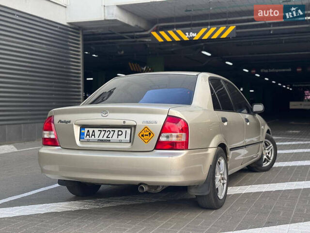 Серый Мазда Протеж, объемом двигателя 2 л и пробегом 85 тыс. км за 3600 $, фото 5 на Automoto.ua