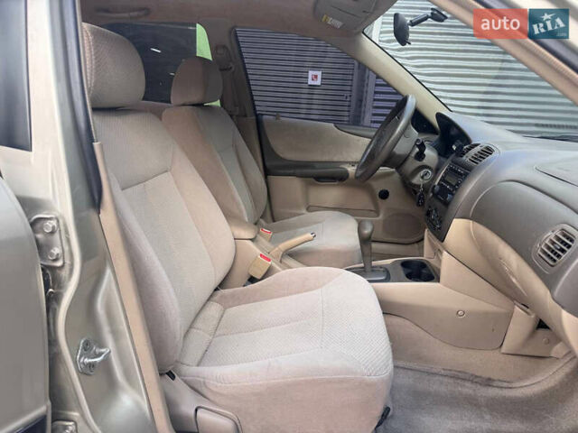 Серый Мазда Протеж, объемом двигателя 2 л и пробегом 85 тыс. км за 3600 $, фото 9 на Automoto.ua