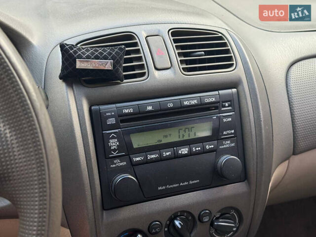 Серый Мазда Протеж, объемом двигателя 2 л и пробегом 85 тыс. км за 3600 $, фото 16 на Automoto.ua