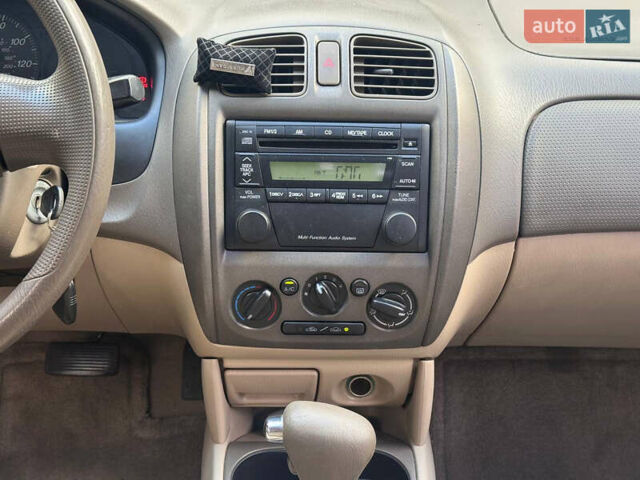 Серый Мазда Протеж, объемом двигателя 2 л и пробегом 85 тыс. км за 3600 $, фото 18 на Automoto.ua