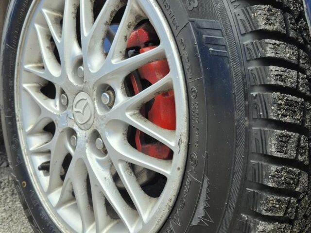 Синій Мазда Протеже, об'ємом двигуна 2 л та пробігом 180 тис. км за 3500 $, фото 12 на Automoto.ua