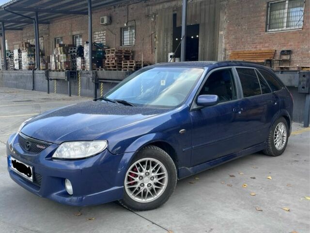 Синий Мазда Протеж, объемом двигателя 2 л и пробегом 298 тыс. км за 3700 $, фото 4 на Automoto.ua