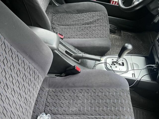 Синий Мазда Протеж, объемом двигателя 2 л и пробегом 298 тыс. км за 3700 $, фото 1 на Automoto.ua