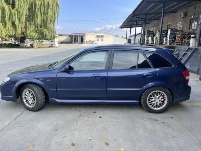 Синий Мазда Протеж, объемом двигателя 2 л и пробегом 298 тыс. км за 3700 $, фото 5 на Automoto.ua