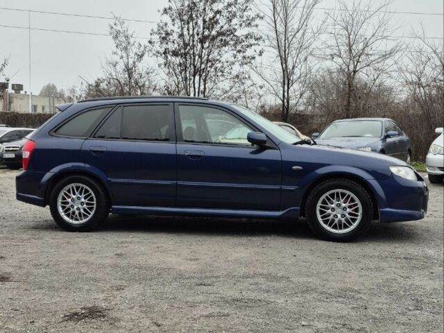 Синій Мазда Протеже, об'ємом двигуна 2 л та пробігом 180 тис. км за 3500 $, фото 5 на Automoto.ua