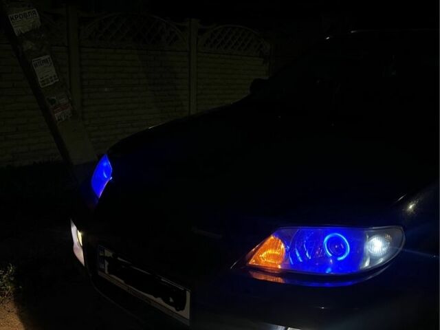 Синий Мазда Протеж, объемом двигателя 2 л и пробегом 298 тыс. км за 3700 $, фото 7 на Automoto.ua