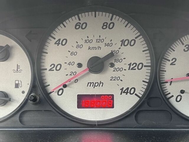 Синий Мазда Протеж, объемом двигателя 2 л и пробегом 298 тыс. км за 3700 $, фото 3 на Automoto.ua