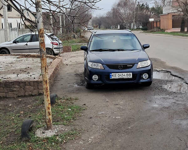 Синій Мазда Протеже, об'ємом двигуна 2 л та пробігом 299 тис. км за 3500 $, фото 3 на Automoto.ua