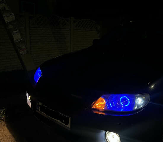 Синій Мазда Протеже, об'ємом двигуна 2 л та пробігом 299 тис. км за 3500 $, фото 9 на Automoto.ua