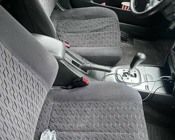 Синій Мазда Протеже, об'ємом двигуна 2 л та пробігом 299 тис. км за 3500 $, фото 11 на Automoto.ua