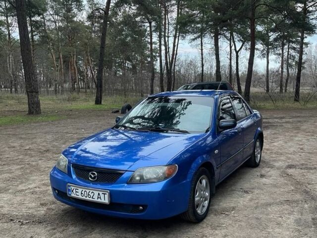 Синий Мазда Протеж, объемом двигателя 2 л и пробегом 220 тыс. км за 2300 $, фото 1 на Automoto.ua