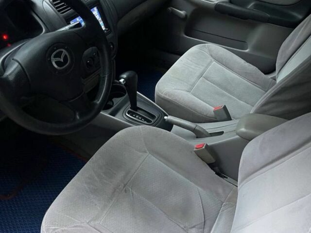 Синий Мазда Протеж, объемом двигателя 2 л и пробегом 220 тыс. км за 2300 $, фото 6 на Automoto.ua