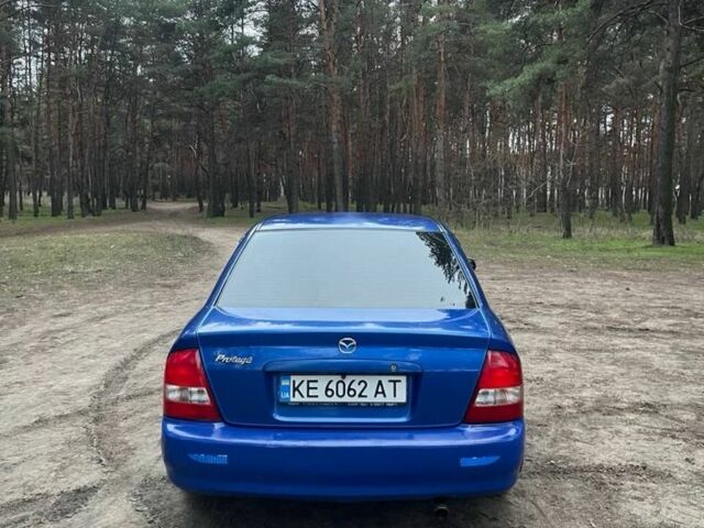 Синий Мазда Протеж, объемом двигателя 2 л и пробегом 220 тыс. км за 2300 $, фото 4 на Automoto.ua