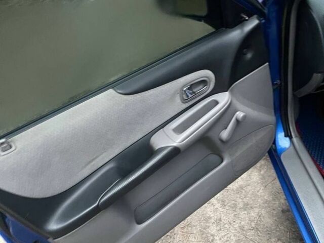 Синий Мазда Протеж, объемом двигателя 2 л и пробегом 220 тыс. км за 2300 $, фото 7 на Automoto.ua