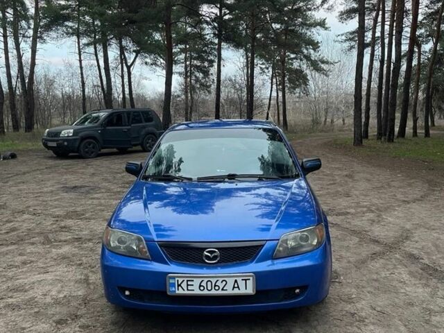 Синий Мазда Протеж, объемом двигателя 2 л и пробегом 220 тыс. км за 2300 $, фото 2 на Automoto.ua