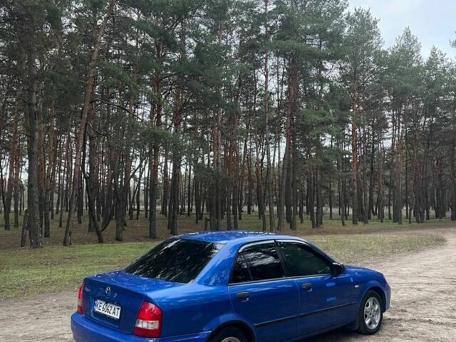 Синий Мазда Протеж, объемом двигателя 2 л и пробегом 220 тыс. км за 2300 $, фото 11 на Automoto.ua