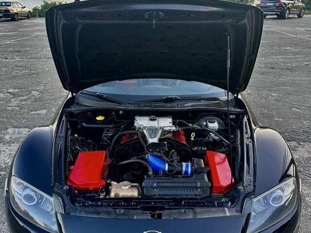 Черный Мазда РХ-8, объемом двигателя 2.5 л и пробегом 115 тыс. км за 6500 $, фото 7 на Automoto.ua