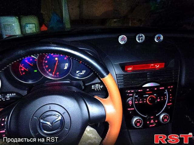 Чорний Мазда РХ-8, об'ємом двигуна 1.8 л та пробігом 147 тис. км за 9600 $, фото 7 на Automoto.ua