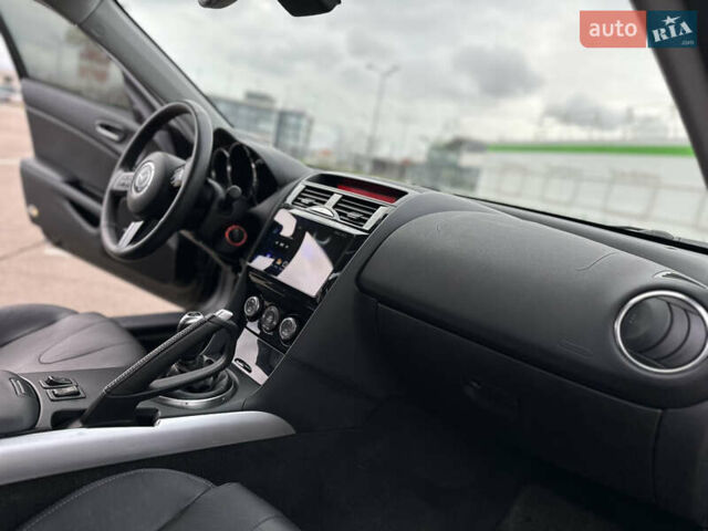 Черный Мазда РХ-8, объемом двигателя 1.31 л и пробегом 94 тыс. км за 7900 $, фото 46 на Automoto.ua