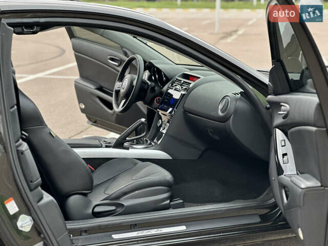 Черный Мазда РХ-8, объемом двигателя 1.31 л и пробегом 94 тыс. км за 7900 $, фото 32 на Automoto.ua