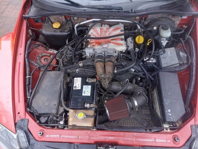 Красный Мазда РХ-8, объемом двигателя 2.5 л и пробегом 180 тыс. км за 3550 $, фото 2 на Automoto.ua