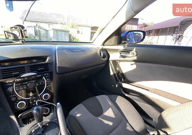 Синий Мазда РХ-8, объемом двигателя 1.3 л и пробегом 108 тыс. км за 4800 $, фото 11 на Automoto.ua