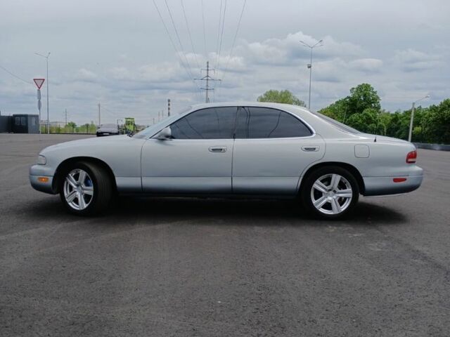 Серый Мазда Сентия, объемом двигателя 3 л и пробегом 200 тыс. км за 4500 $, фото 1 на Automoto.ua