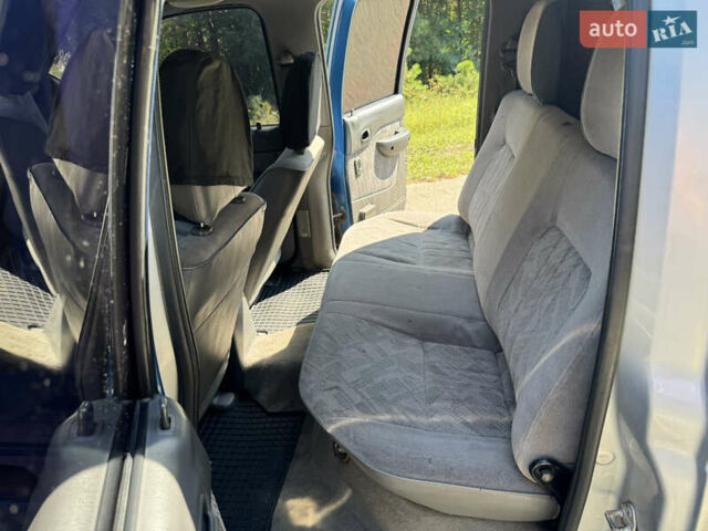 Белый Мазда Трибьют, объемом двигателя 2.5 л и пробегом 387 тыс. км за 4750 $, фото 12 на Automoto.ua