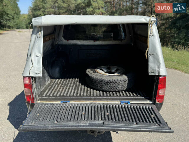 Белый Мазда Трибьют, объемом двигателя 2.5 л и пробегом 387 тыс. км за 4750 $, фото 14 на Automoto.ua