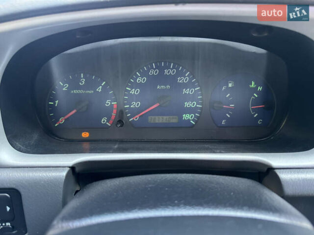 Белый Мазда Трибьют, объемом двигателя 2.5 л и пробегом 387 тыс. км за 4750 $, фото 17 на Automoto.ua