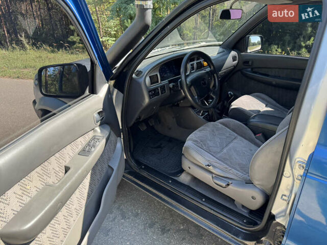 Белый Мазда Трибьют, объемом двигателя 2.5 л и пробегом 387 тыс. км за 4750 $, фото 8 на Automoto.ua