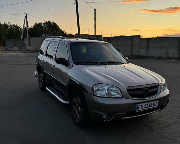 Бежевый Мазда Трибьют, объемом двигателя 3 л и пробегом 222 тыс. км за 4000 $, фото 1 на Automoto.ua