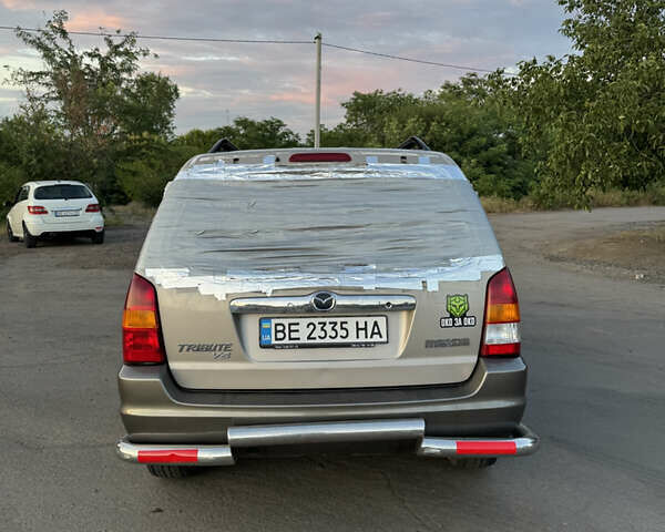 Бежевый Мазда Трибьют, объемом двигателя 3 л и пробегом 222 тыс. км за 4000 $, фото 3 на Automoto.ua