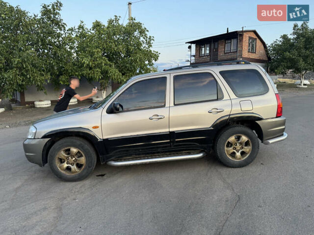 Бежевый Мазда Трибьют, объемом двигателя 3 л и пробегом 222 тыс. км за 4000 $, фото 4 на Automoto.ua