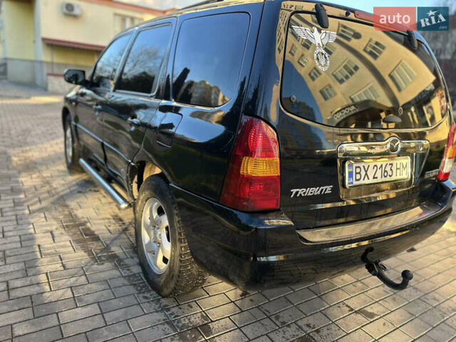 Черный Мазда Трибьют, объемом двигателя 2 л и пробегом 267 тыс. км за 4999 $, фото 17 на Automoto.ua