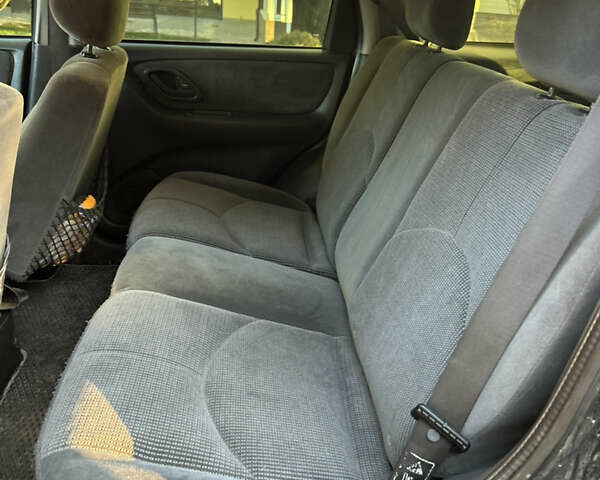 Черный Мазда Трибьют, объемом двигателя 2 л и пробегом 267 тыс. км за 4999 $, фото 34 на Automoto.ua