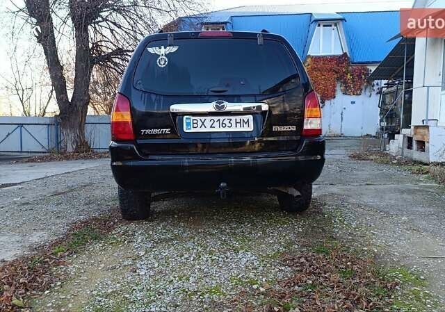 Чорний Мазда Трибьют, об'ємом двигуна 2 л та пробігом 267 тис. км за 4800 $, фото 9 на Automoto.ua