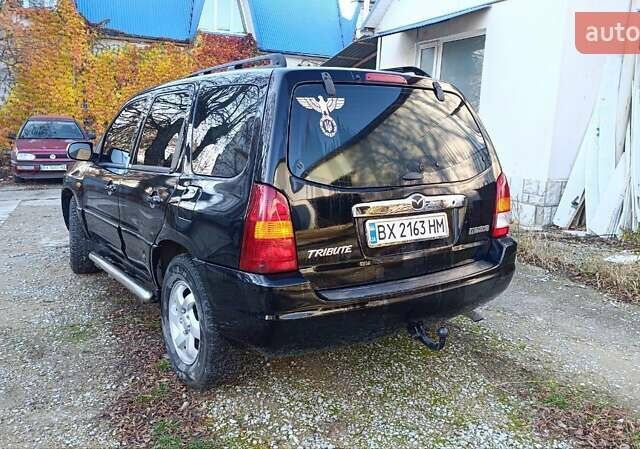 Чорний Мазда Трибьют, об'ємом двигуна 2 л та пробігом 267 тис. км за 4800 $, фото 8 на Automoto.ua