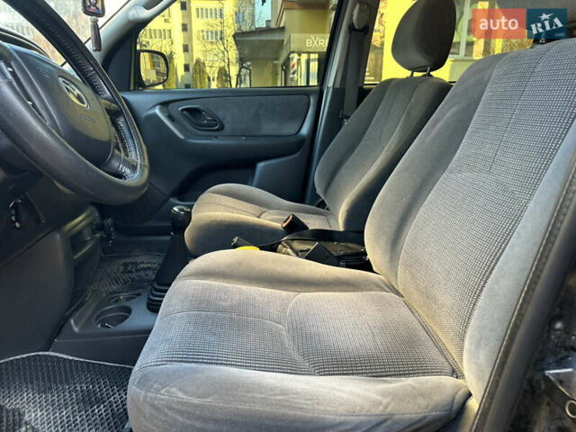 Черный Мазда Трибьют, объемом двигателя 2 л и пробегом 267 тыс. км за 4999 $, фото 31 на Automoto.ua