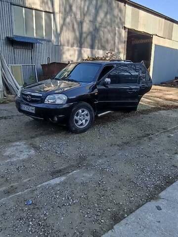 Чорний Мазда Трибьют, об'ємом двигуна 2 л та пробігом 267 тис. км за 4800 $, фото 14 на Automoto.ua