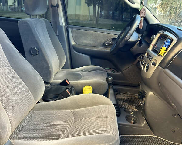 Черный Мазда Трибьют, объемом двигателя 2 л и пробегом 267 тыс. км за 4999 $, фото 36 на Automoto.ua