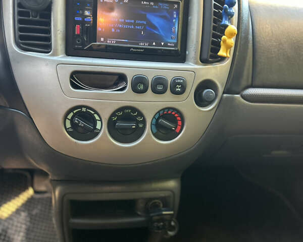 Черный Мазда Трибьют, объемом двигателя 2 л и пробегом 267 тыс. км за 4999 $, фото 28 на Automoto.ua