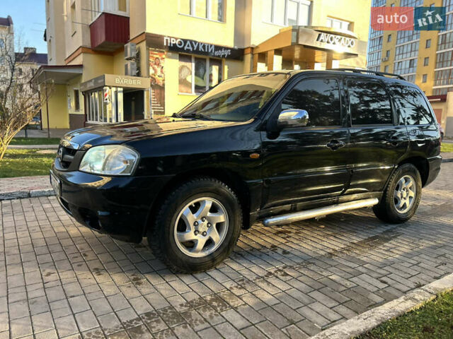 Черный Мазда Трибьют, объемом двигателя 2 л и пробегом 267 тыс. км за 4999 $, фото 3 на Automoto.ua
