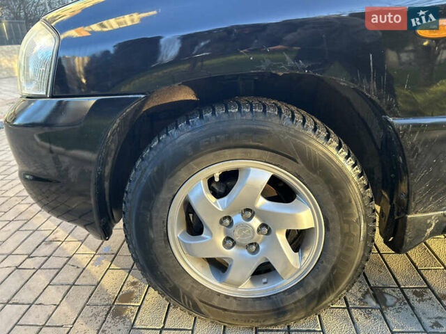 Черный Мазда Трибьют, объемом двигателя 2 л и пробегом 267 тыс. км за 4999 $, фото 21 на Automoto.ua