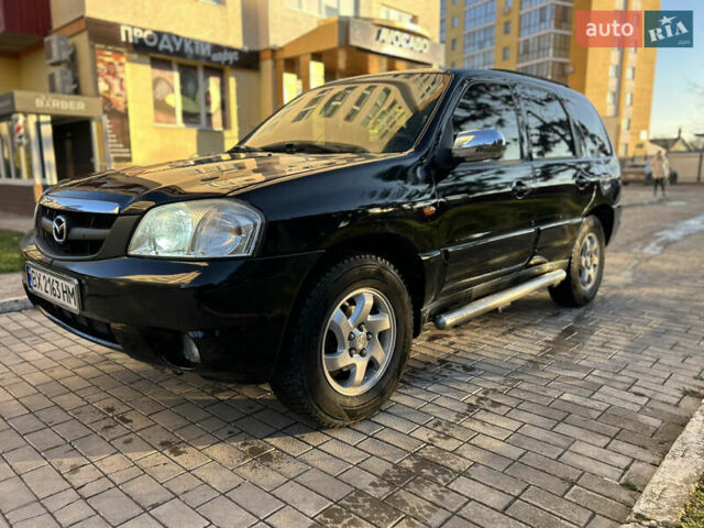 Черный Мазда Трибьют, объемом двигателя 2 л и пробегом 267 тыс. км за 4999 $, фото 23 на Automoto.ua