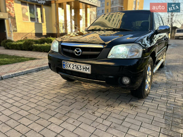 Черный Мазда Трибьют, объемом двигателя 2 л и пробегом 267 тыс. км за 4999 $, фото 6 на Automoto.ua