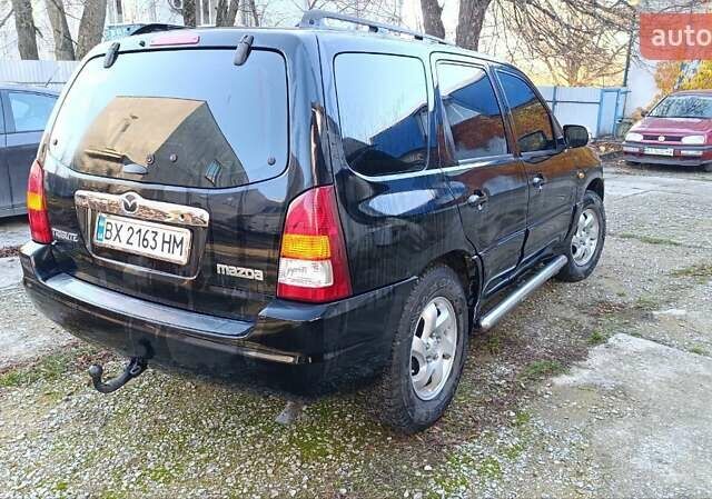 Чорний Мазда Трибьют, об'ємом двигуна 2 л та пробігом 267 тис. км за 4800 $, фото 6 на Automoto.ua