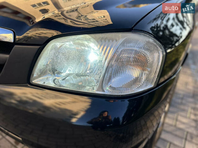 Черный Мазда Трибьют, объемом двигателя 2 л и пробегом 267 тыс. км за 4999 $, фото 7 на Automoto.ua