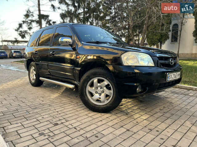 Черный Мазда Трибьют, объемом двигателя 2 л и пробегом 267 тыс. км за 4999 $, фото 1 на Automoto.ua